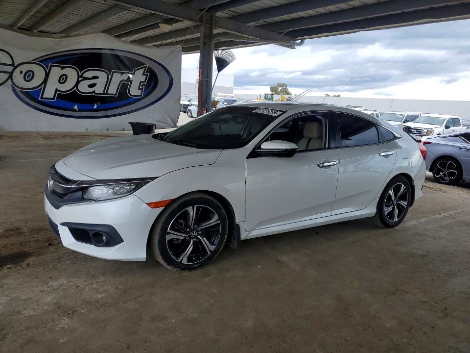 HONDA CIVIC 2017 with VIN 19XFC1F95HE020986 - Photo from auction