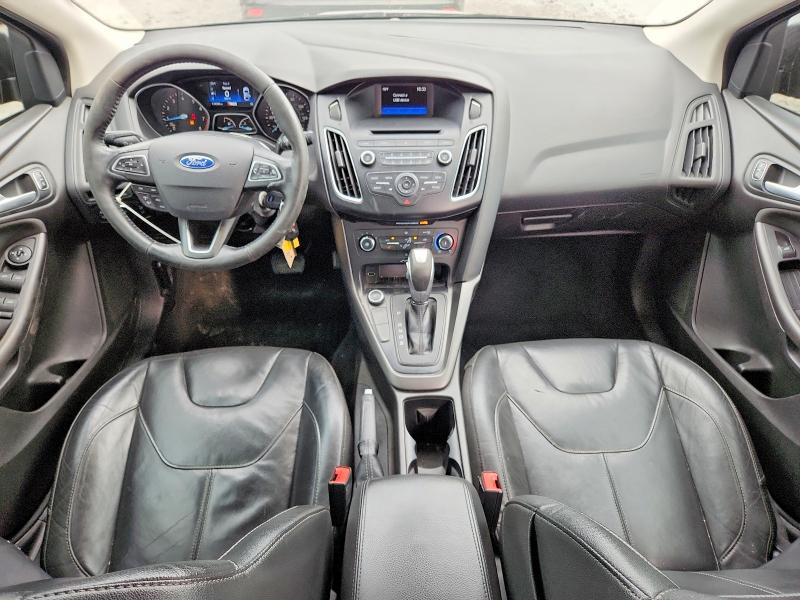 Photo 8 from auction – 2015 FORD FOCUS with VIN 1FADP3F28FL348312