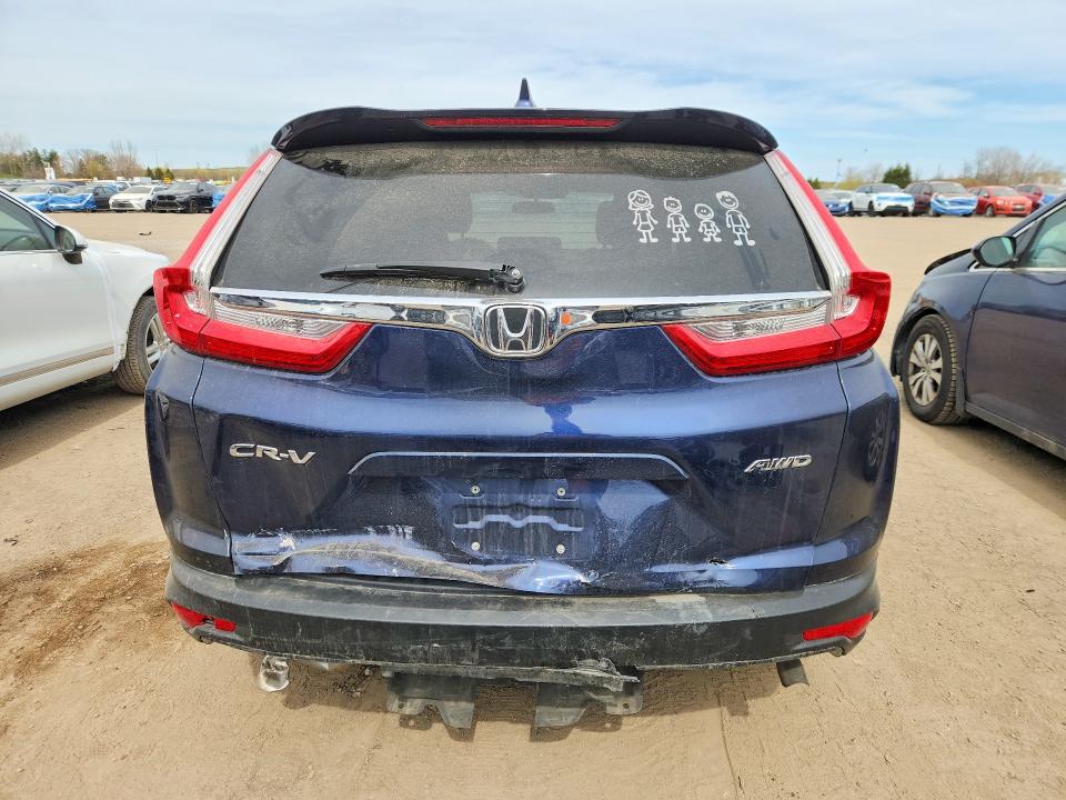 Photo 6 from auction – 2018 HONDA CR-V with VIN 2HKRW2H56JH122402
