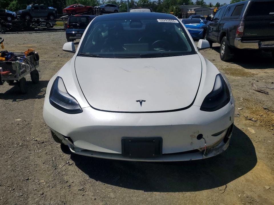 Photo 5 from auction – 2023 TESLA MODEL 3 with VIN 5YJ3E1EA2PF623962