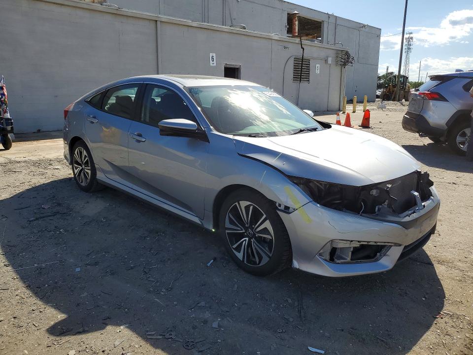Photo 4 from auction – 2017 HONDA CIVIC with VIN 2HGFC1F31HH634368