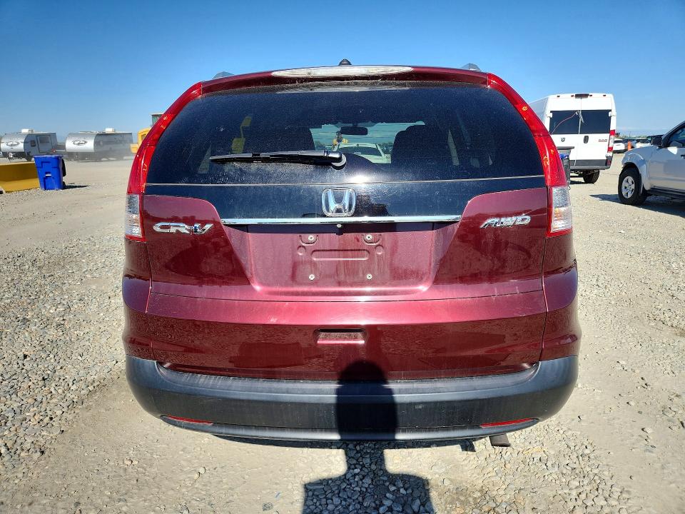 Photo 6 from auction – 2014 HONDA CR-V with VIN 5J6RM4H70EL039305
