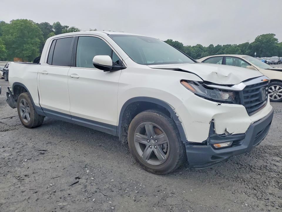 Photo 4 from auction – 2023 HONDA RIDGELINE with VIN 5FPYK3F55PB013363