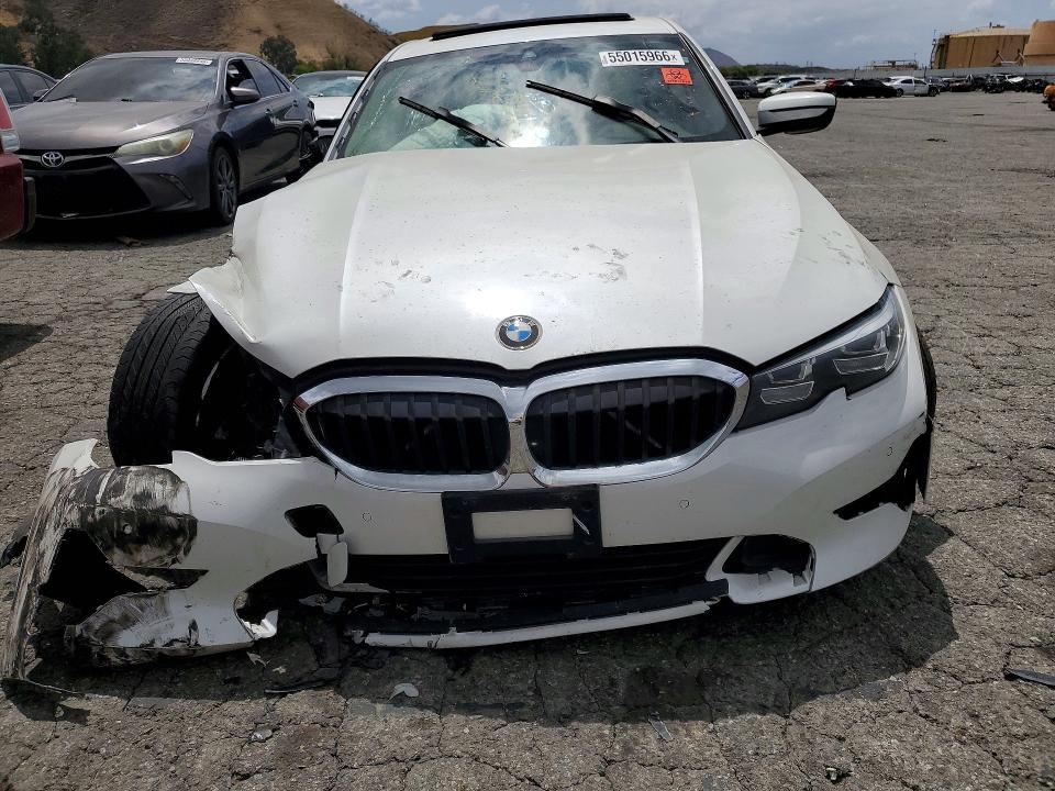 Photo 5 from auction – 2020 BMW 330I with VIN 3MW5R1J05L8B32601