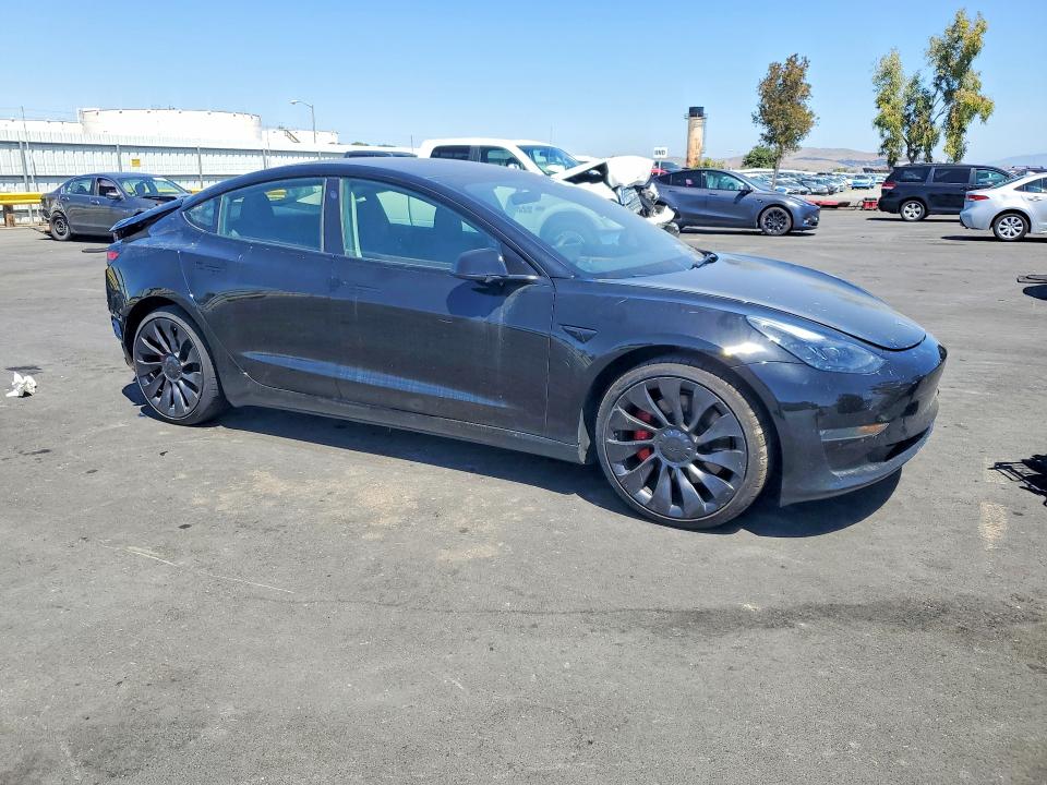 Photo 4 from auction – 2023 TESLA MODEL 3 with VIN 5YJ3E1EC7PF707759
