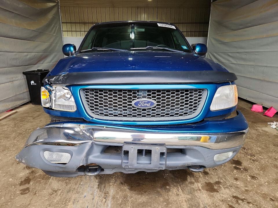 Photo 5 from auction – 2000 FORD F150 with VIN 1FTZF1829YNB02008