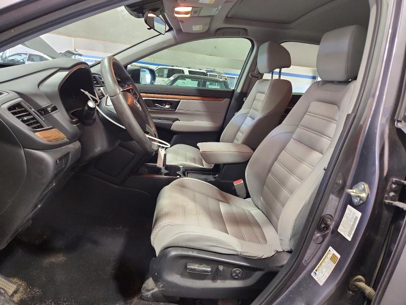 Photo 7 from auction – 2018 HONDA CR-V with VIN 7FARW1H54JE037815