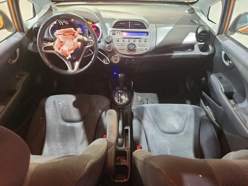 Photo 8 from auction – 2009 HONDA FIT with VIN JHMGE88499S048490