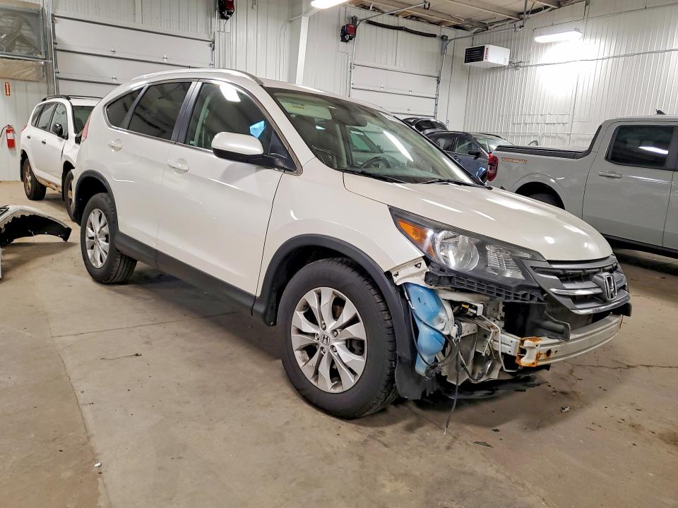 Photo 4 from auction – 2014 HONDA CR-V with VIN 5J6RM4H74EL012852