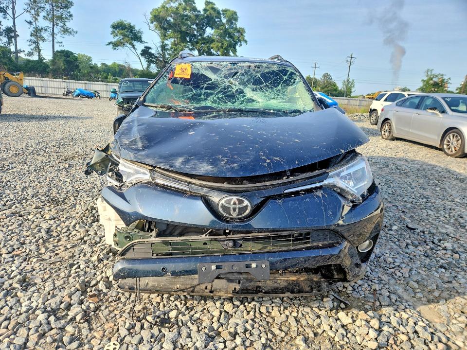 Photo 5 from auction – 2017 TOYOTA RAV4 with VIN 2T3YFREV1HW324012