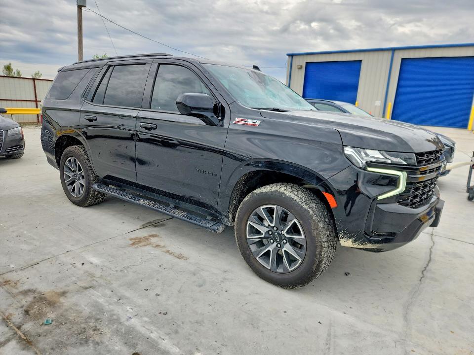 Photo 4 from auction – 2023 CHEVROLET TAHOE with VIN 1GNSKPKD7PR123061
