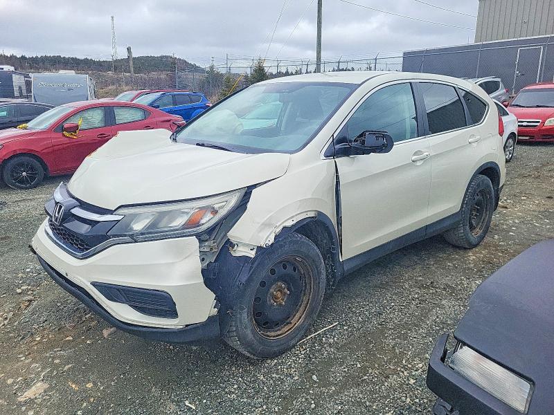 HONDA CR-V 2015 with VIN 2HKRM4H42FH123420 - Photo from auction