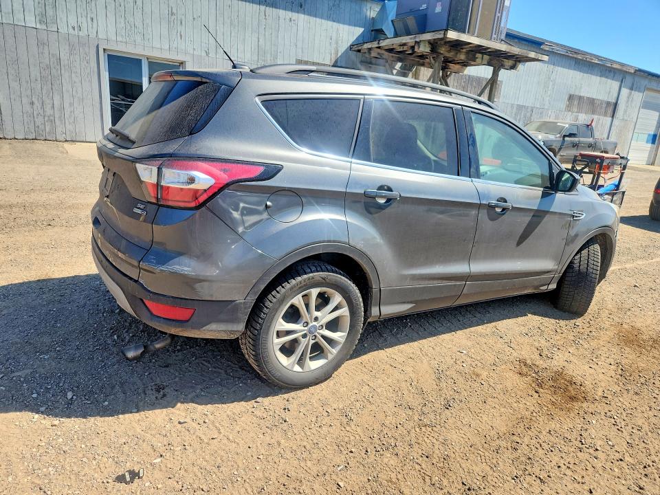 Foto 3 de la subasta – 2017 FORD ESCAPE con VIN 1FMCU9GD5HUD18193