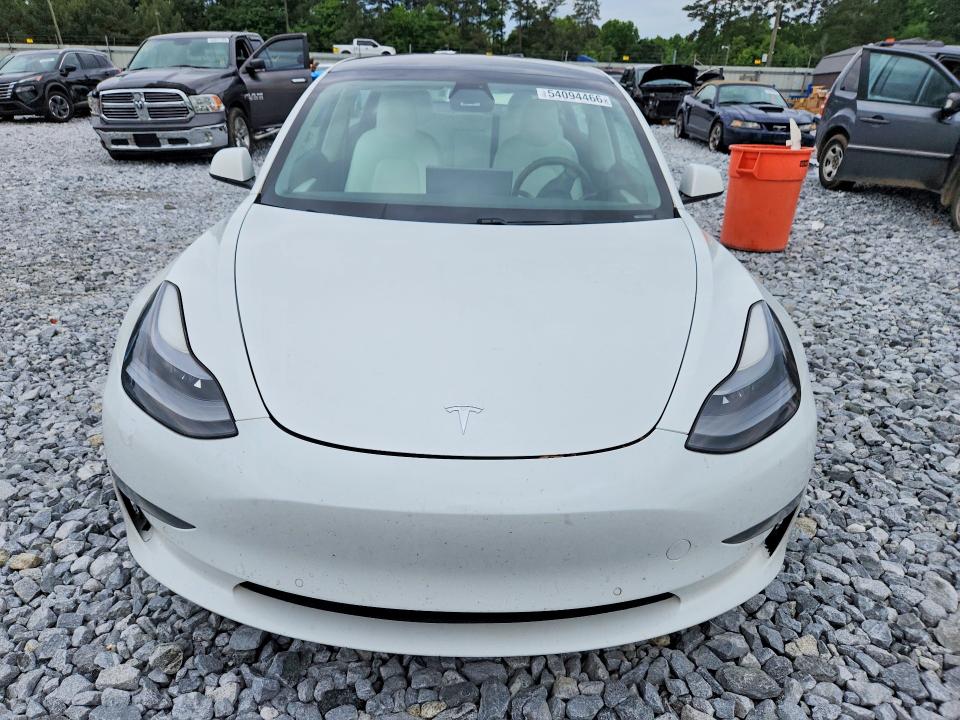 Photo 5 from auction – 2021 TESLA MODEL 3 with VIN 5YJ3E1EC2MF020233