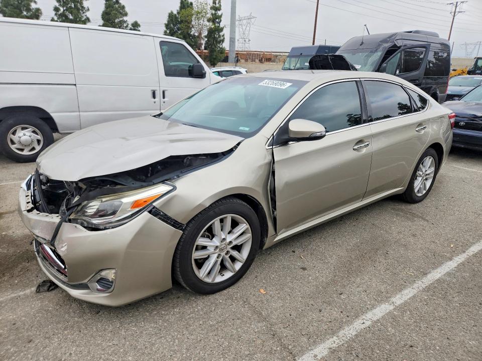 TOYOTA AVALON 2014 with VIN 4T1BK1EB5EU111190 - Photo from auction