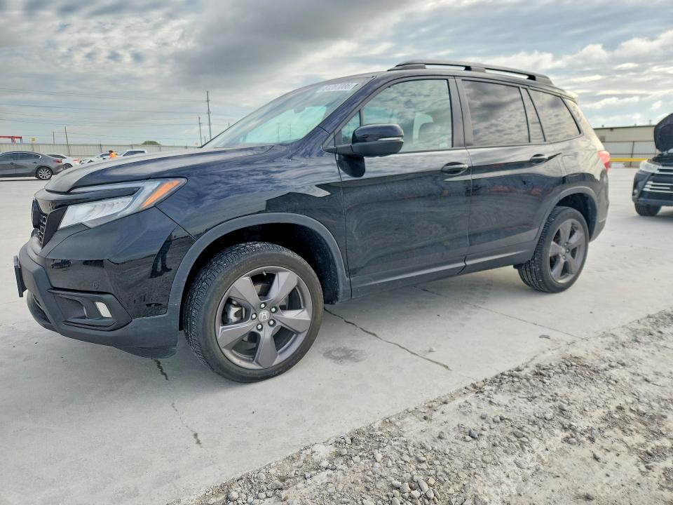 HONDA PASSPORT 2021 with VIN 5FNYF8H96MB040898 - Photo from auction