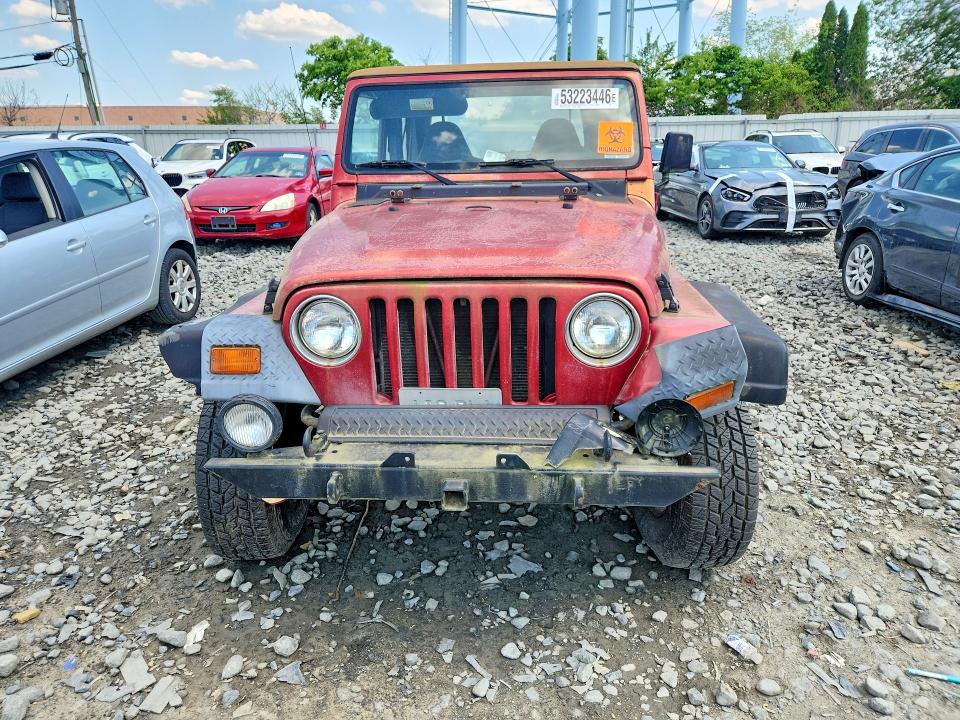 Photo 5 from auction – 1999 JEEP WRANGLER with VIN 1J4FY19S1XP485046