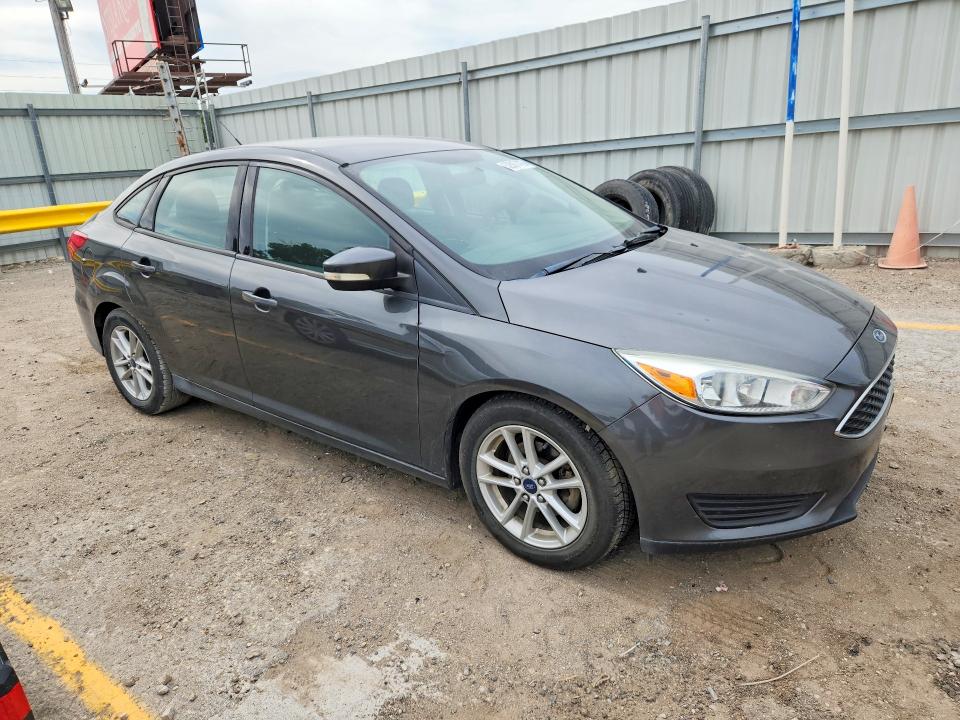 Photo 4 from auction – 2016 FORD FOCUS with VIN 1FADP3F27GL262684