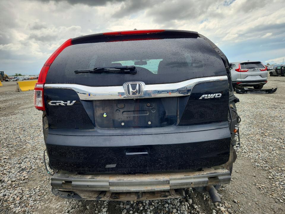 Photo 6 from auction – 2016 HONDA CR-V with VIN 5J6RM4H77GL050837