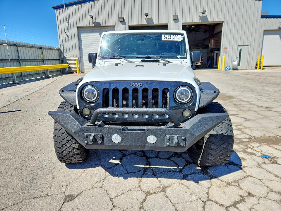 Photo 5 from auction – 2015 JEEP WRANGLER with VIN 1C4AJWAG4FL659741