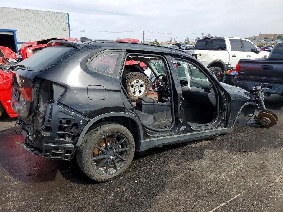 Photo 3 from auction – 2015 BMW X1 with VIN WBAVM1C5XFVW58778