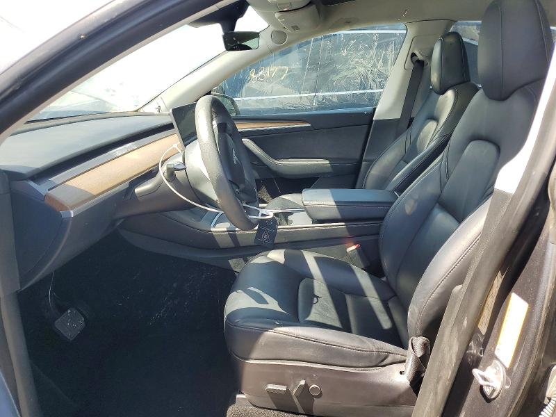 Photo 7 from auction – 2023 TESLA MODEL Y with VIN 7SAYGAEE6PF700385