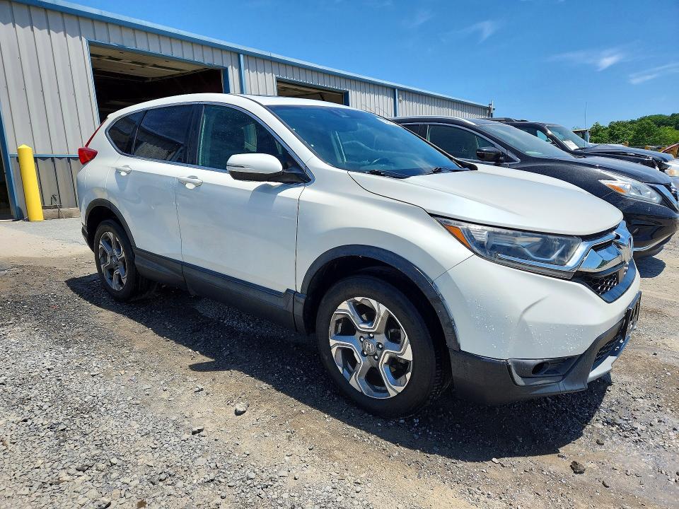 Photo 4 from auction – 2017 HONDA CR-V with VIN 2HKRW2H85HH653708