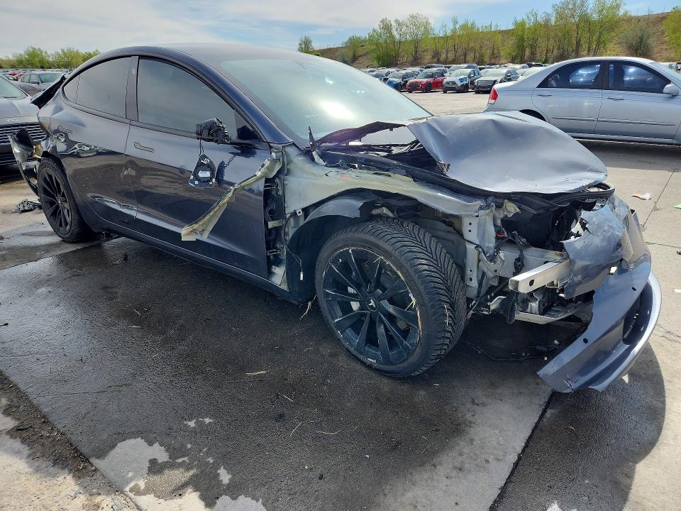 Photo 4 from auction – 2022 TESLA MODEL 3 with VIN 5YJ3E1EB1NF190334