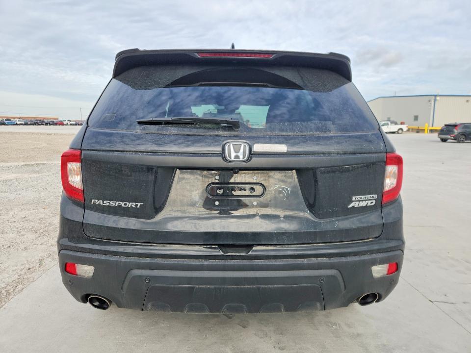 Photo 6 from auction – 2021 HONDA PASSPORT with VIN 5FNYF8H96MB040898