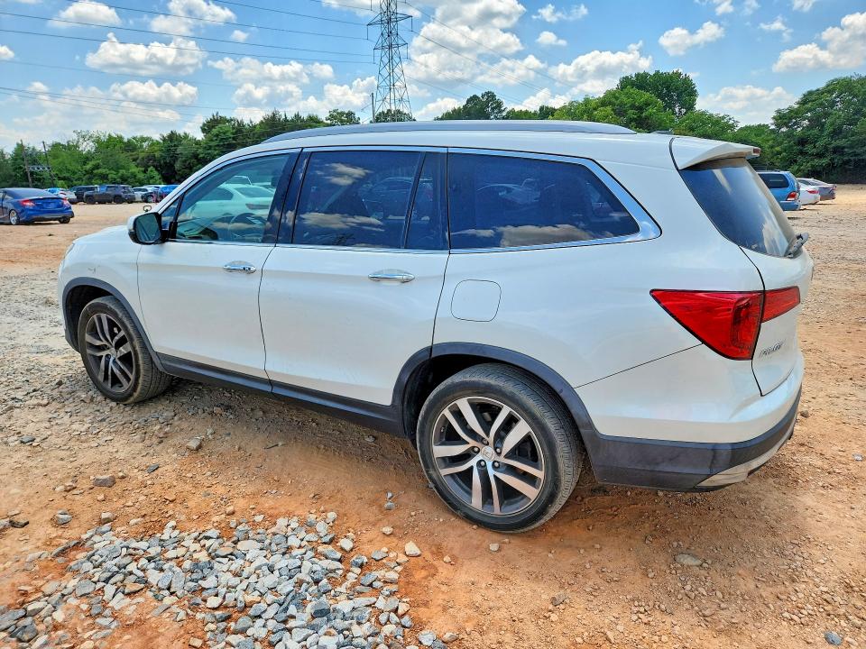 Photo 2 from auction – 2016 HONDA PILOT with VIN 5FNYF5H93GB051389