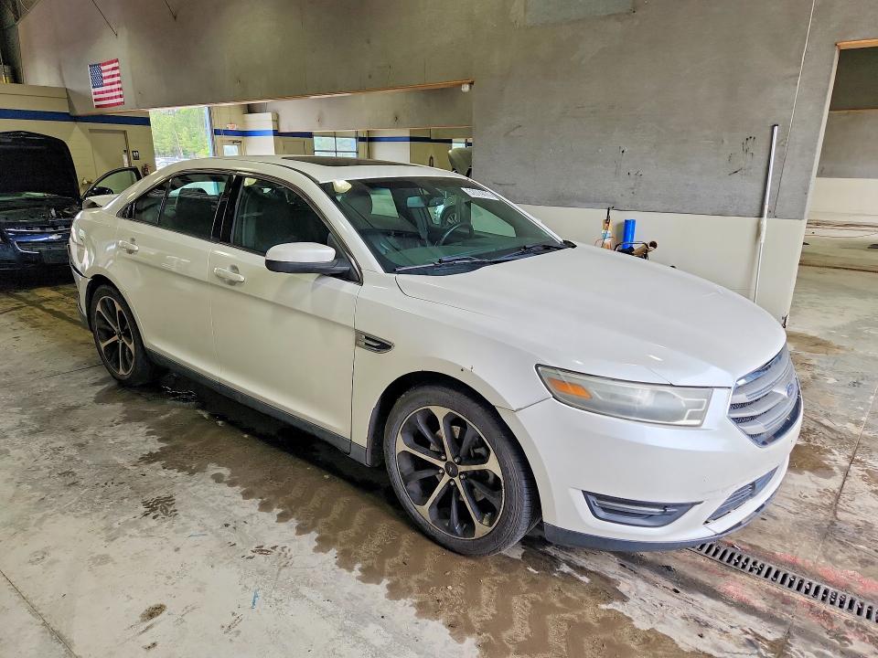 Photo 4 from auction – 2014 FORD TAURUS with VIN 1FAHP2E84EG136189