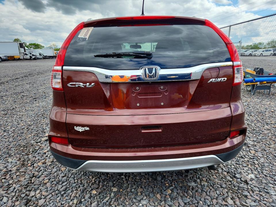 Photo 6 from auction – 2015 HONDA CR-V with VIN 5J6RM4H7XFL041841