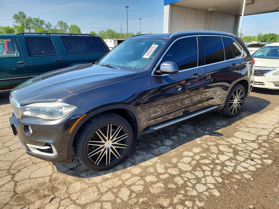 BMW X5 2015 with VIN 5UXKR6C51F0J77611 - Photo from auction