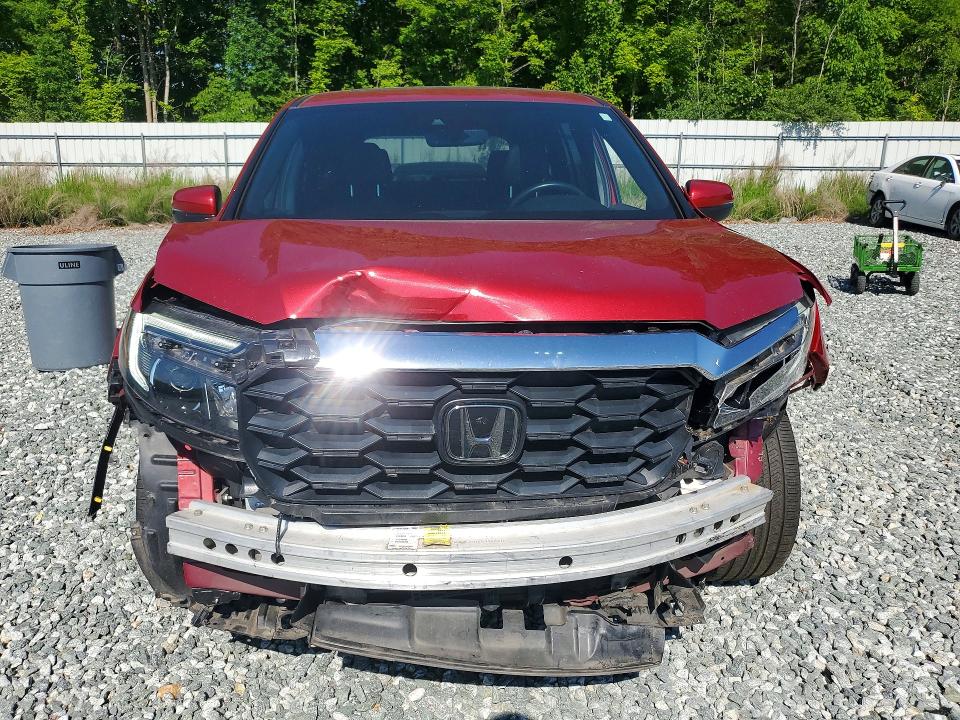 Photo 5 from auction – 2022 HONDA PASSPORT with VIN 5FNYF7H50NB007095