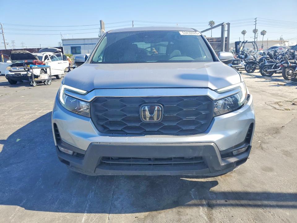 Photo 5 from auction – 2024 HONDA PASSPORT with VIN 5FNYF8H59RB008869