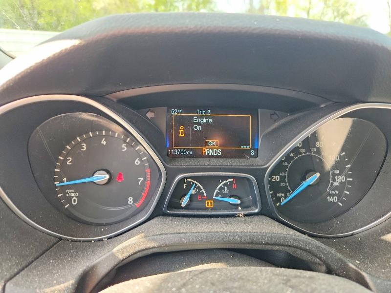 Photo 9 from auction – 2016 FORD FOCUS with VIN 1FADP3F25GL299720