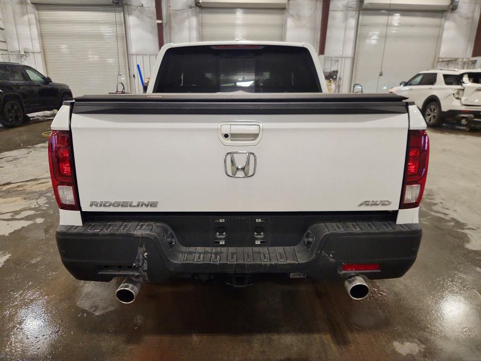 Photo 6 from auction – 2023 HONDA RIDGELINE with VIN 5FPYK3F75PB057655