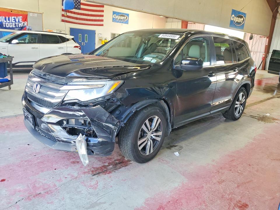 HONDA PILOT 2017 with VIN 5FNYF6H54HB052748 - Photo from auction