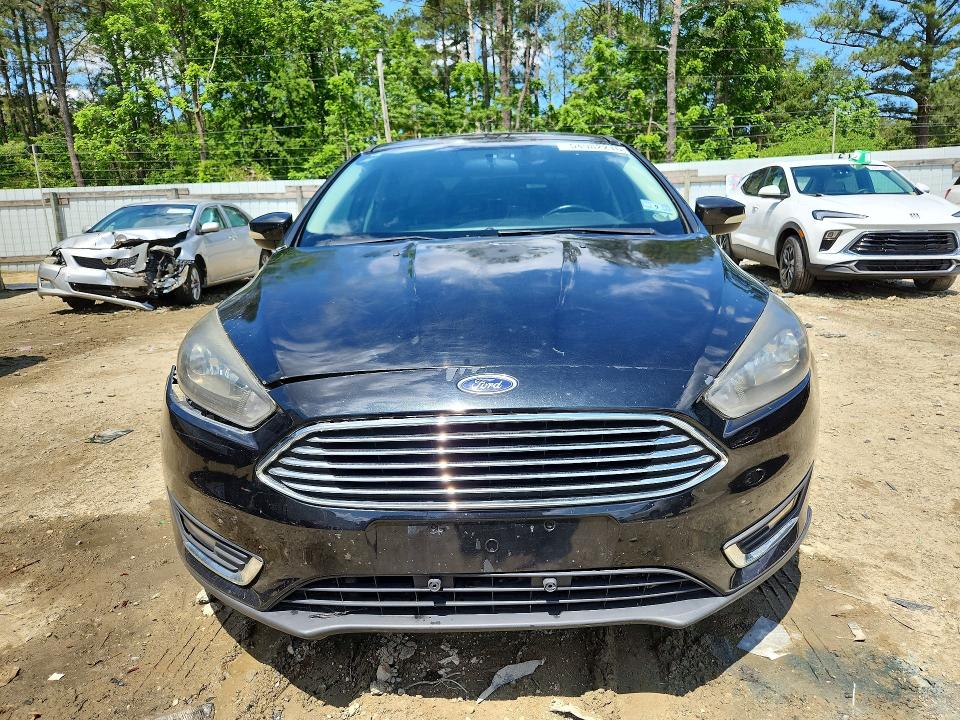 Photo 5 from auction – 2014 FORD FOCUS with VIN 1FADP3F27EL386693