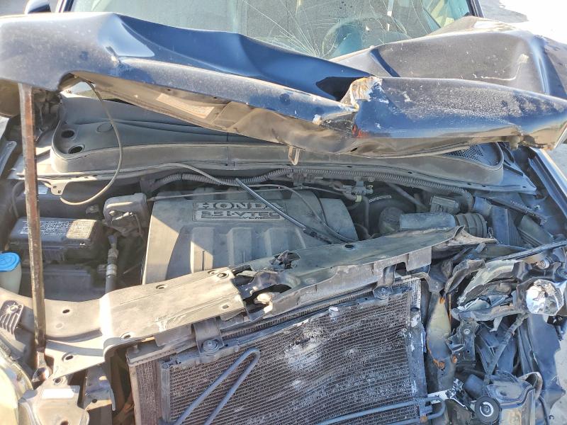 Photo 12 from auction – 2006 HONDA PILOT with VIN 5FNYF28586B014977