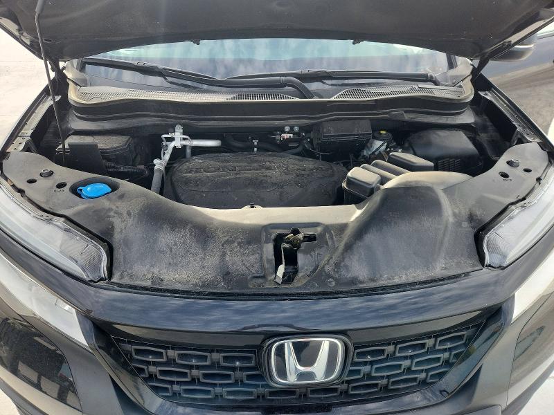 Photo 12 from auction – 2021 HONDA PASSPORT with VIN 5FNYF8H96MB040898