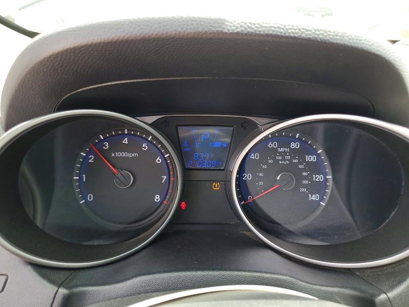 Photo 9 from auction – 2011 HYUNDAI TUCSON with VIN KM8JUCAC2BU312122