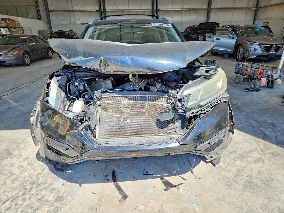 Photo 5 from auction – 2016 HONDA CR-V with VIN 5J6RM4H49GL043183