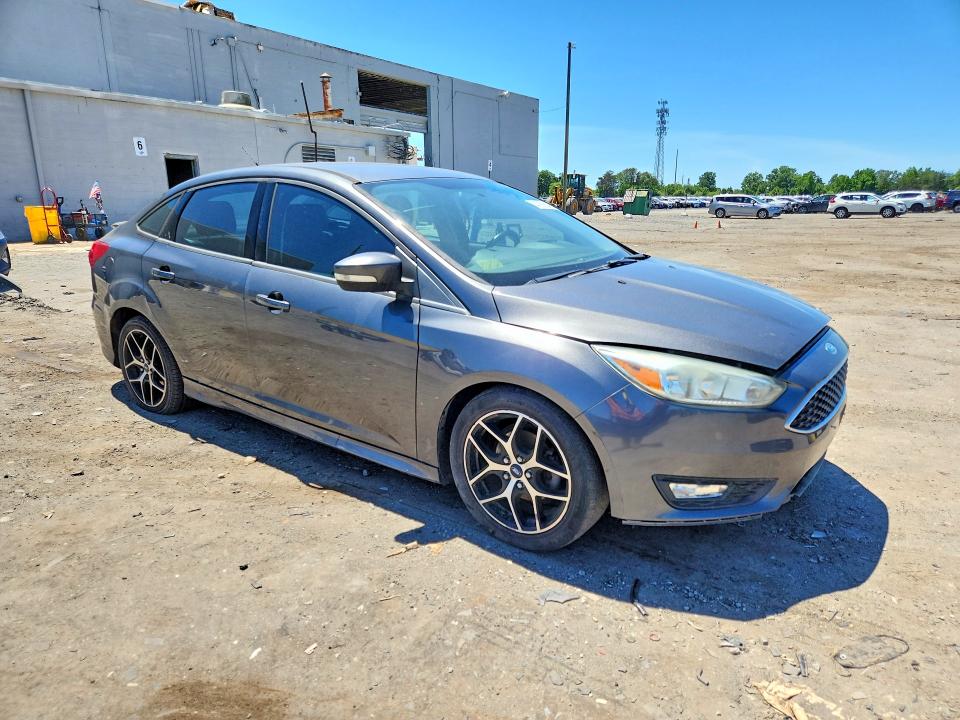 Photo 4 from auction – 2015 FORD FOCUS with VIN 1FADP3F2XFL253072