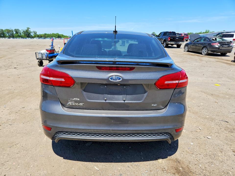 Photo 6 from auction – 2015 FORD FOCUS with VIN 1FADP3F2XFL253072