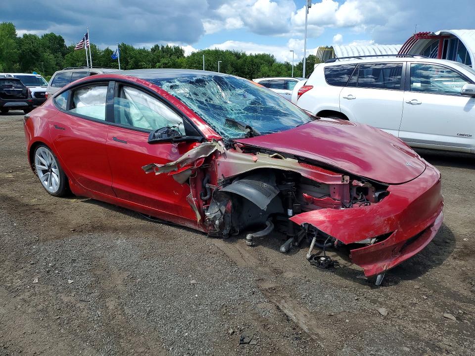 Photo 4 from auction – 2022 TESLA MODEL 3 with VIN 5YJ3E1EA2NF187773