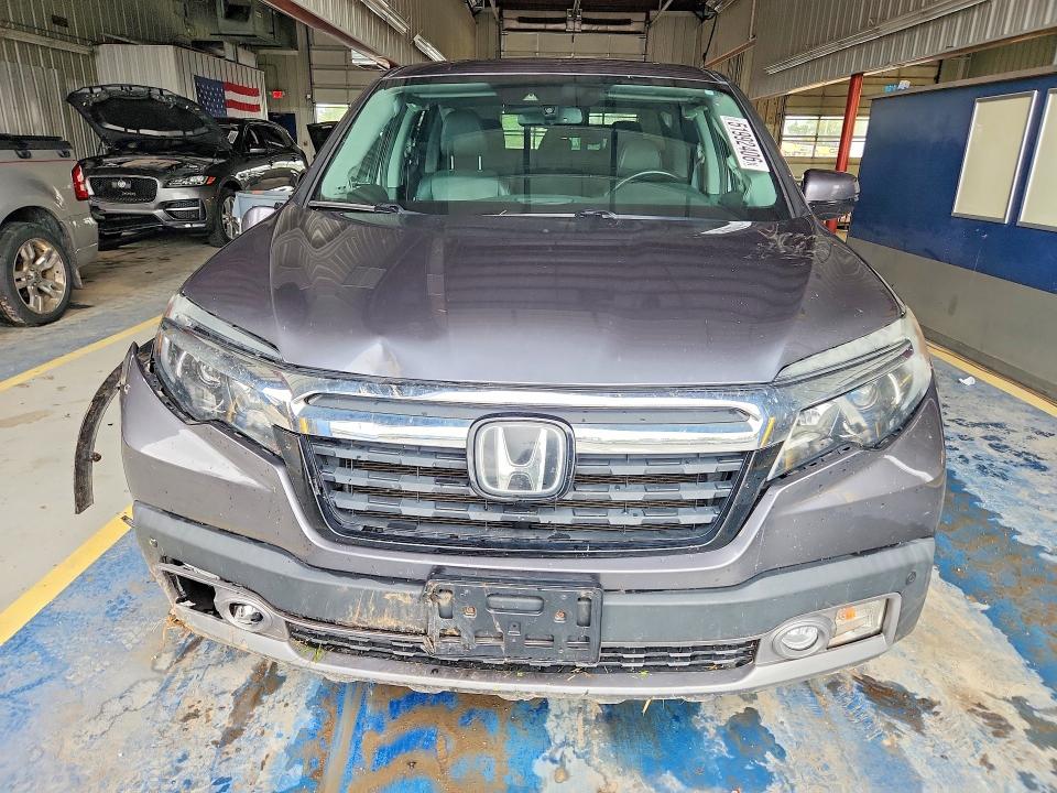 Photo 5 from auction – 2019 HONDA RIDGELINE with VIN 5FPYK3F7XKB035868