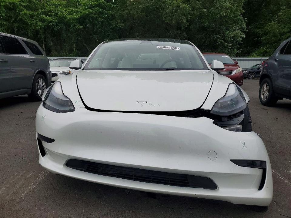 Photo 5 from auction – 2023 TESLA MODEL 3 with VIN 5YJ3E1EA0PF652814
