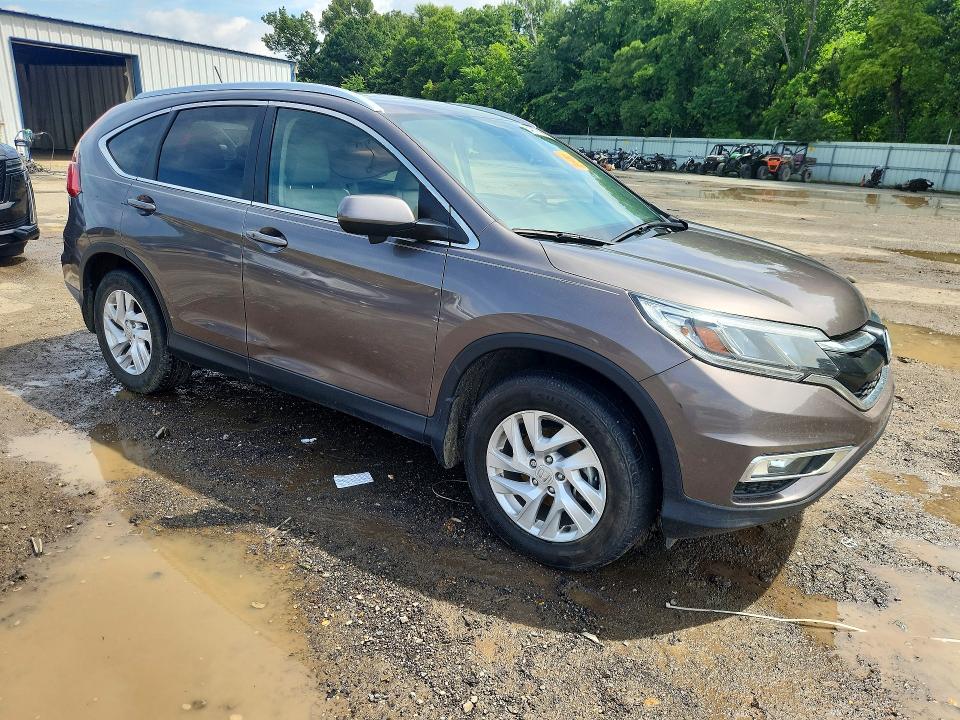 Photo 4 from auction – 2015 HONDA CR-V with VIN 2HKRM3H76FH539197