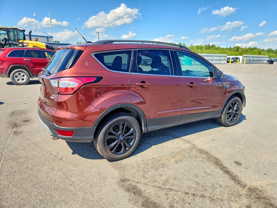 Photo 3 from auction – 2018 FORD ESCAPE with VIN 1FMCU9GD3JUA12468